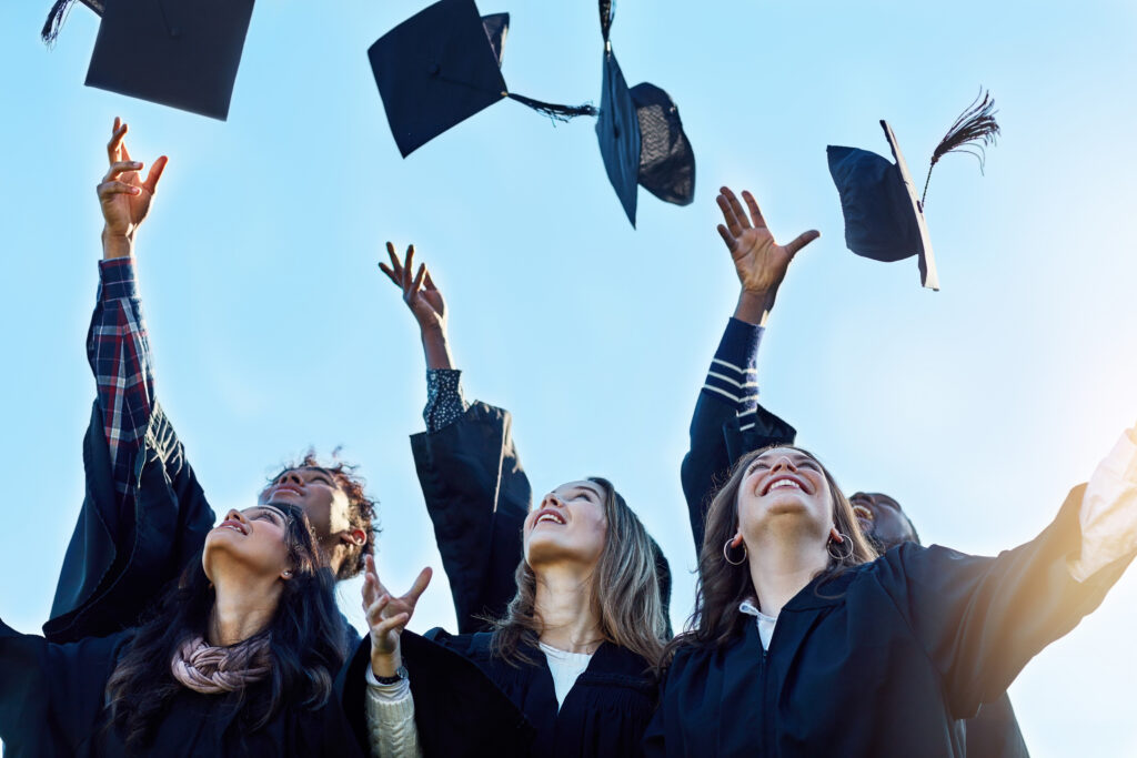 excited-graduates-tossing-graduation-caps-in-the-a-2026-03-25-02-21-43-utc